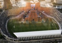 Futuro del Heliodoro: plan, retrasos y credibilidad Vista aérea del estadio Heliodoro Rodríguez López con la imagen difuminada del pleno del Cabildo de Tenerife superpuesta sobre el terreno de juego.