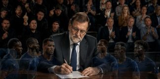 El racismo de Rajoy no fue un desliz político Mariano Rajoy escribe una columna ante un escritorio, rodeado por imágenes semitransparentes de futbolistas franceses y una grada dividida entre aplausos y rechazo.